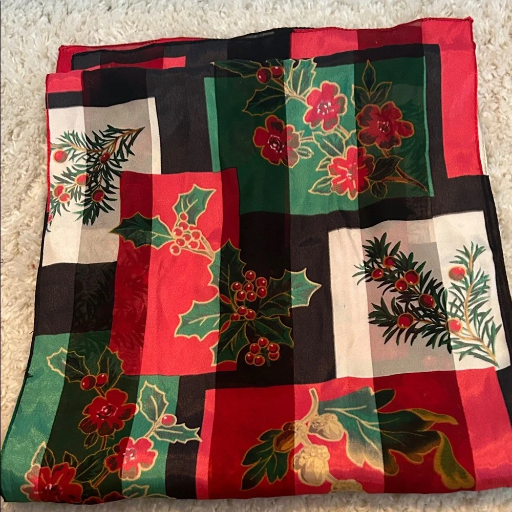 Holiday Scarf with Holly Design 58 inches long and 13 inches wide . There were.